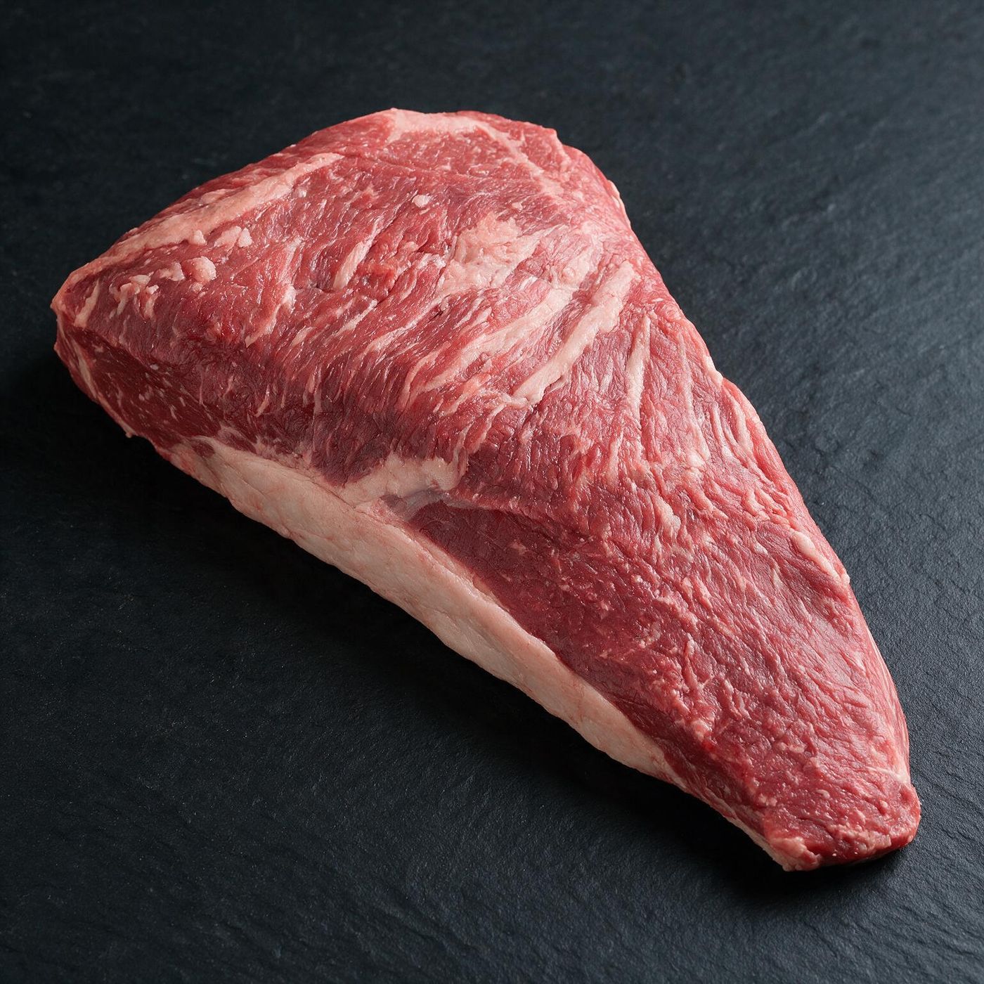 Black Angus Tri Tip halal UK supplier on dark slate