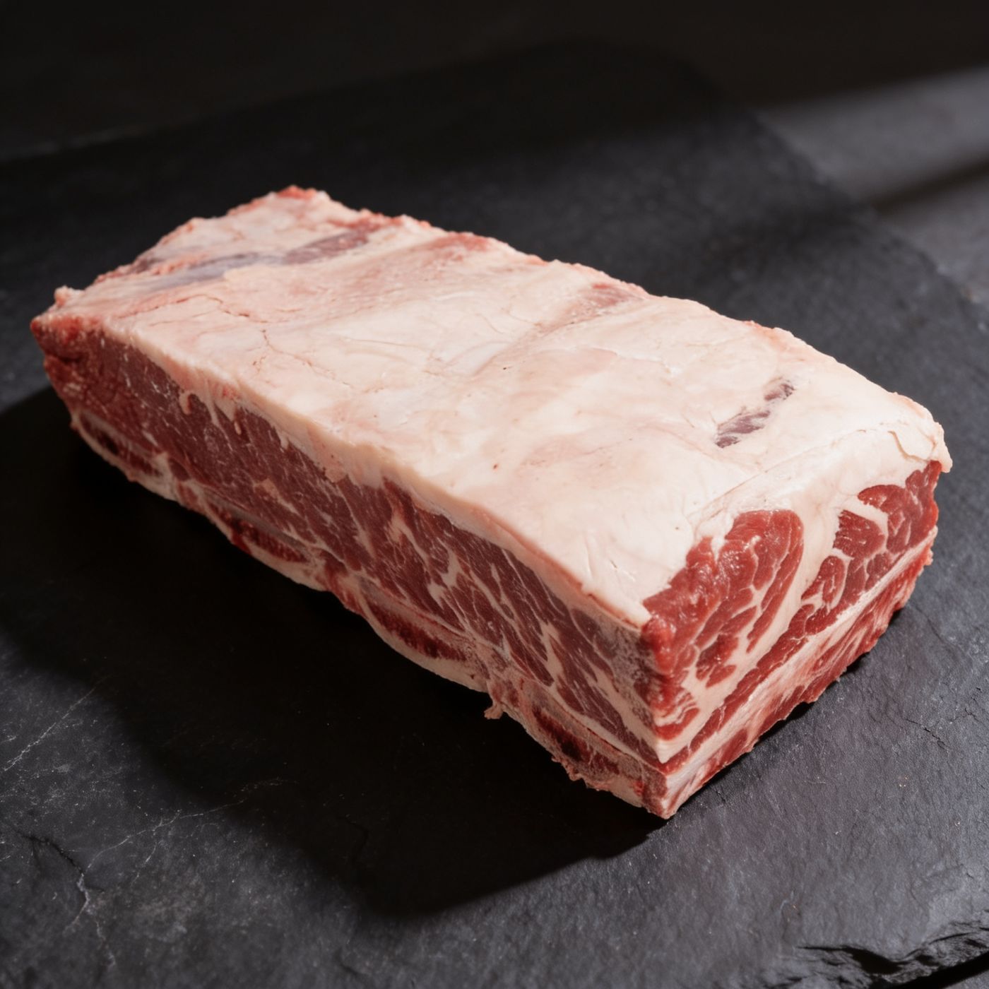 Black Angus Short Ribs halal UK supplier on dark slate