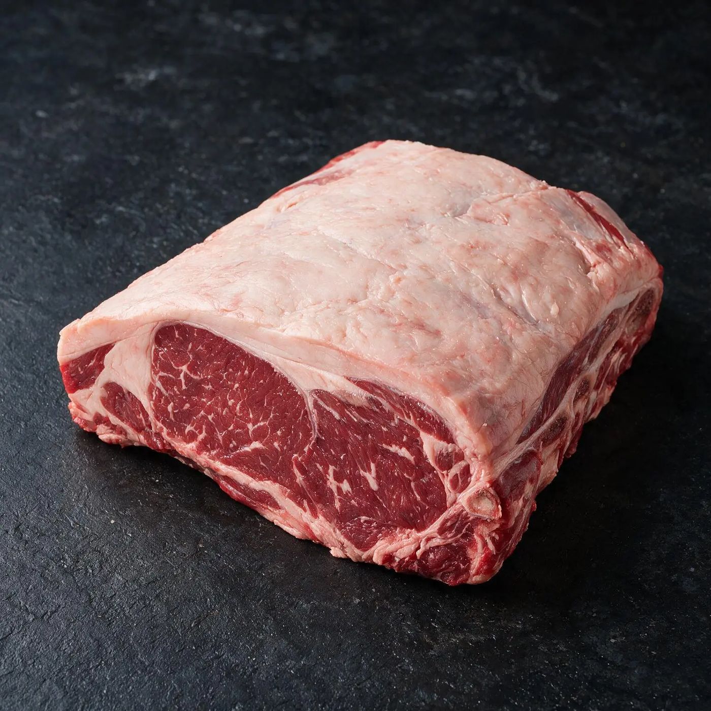 Black Angus Sirloin halal UK supplier on dark slate